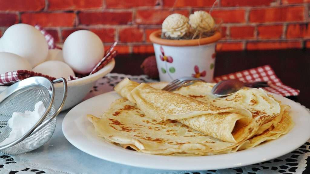 Chandeleur het feestelijk nuttigen van pannenkoeken